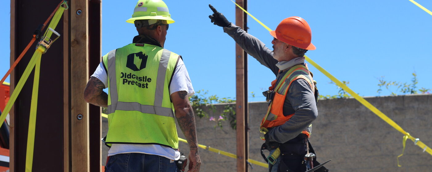 G.A. Dominguez owner directing crew on commercial steel project